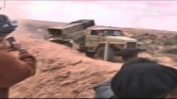 قوات القذافى تقصف الثوار فى ليبيا مدينة بن جواد