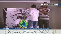 الفنان هيثم غراب يرسم الرئيس مرسي برابعة
